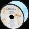 Action Geschenkverpackung<Geschenkband